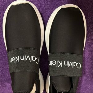 Brand new Calvin Klein slip on sneakers